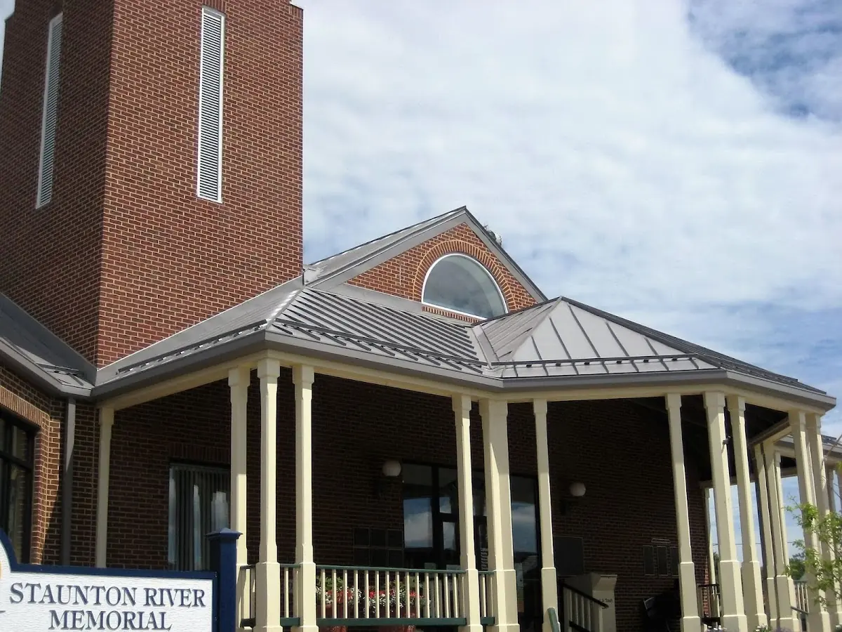 Skilled roofing craftsmen working on a residential roof in Upland